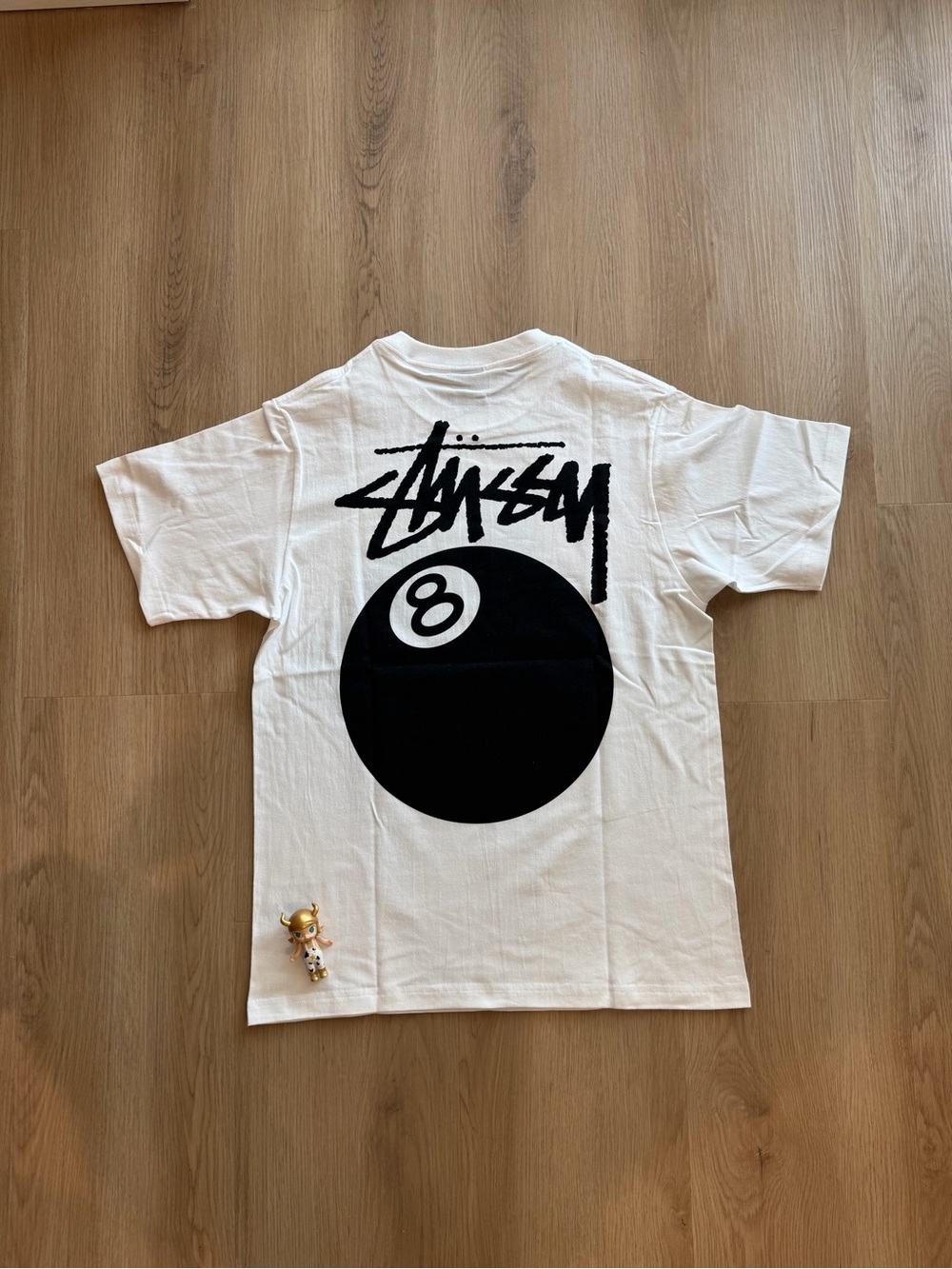 Stussy White Short Sleeve Tee with Black 8-Ball Graphic